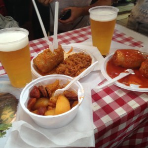Stuffed cabbage, stuff paprika and potatoes layered with sausage 