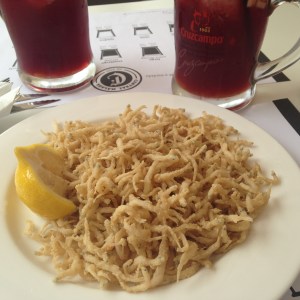 Freshly caught and deep fried whitebaits with sangria